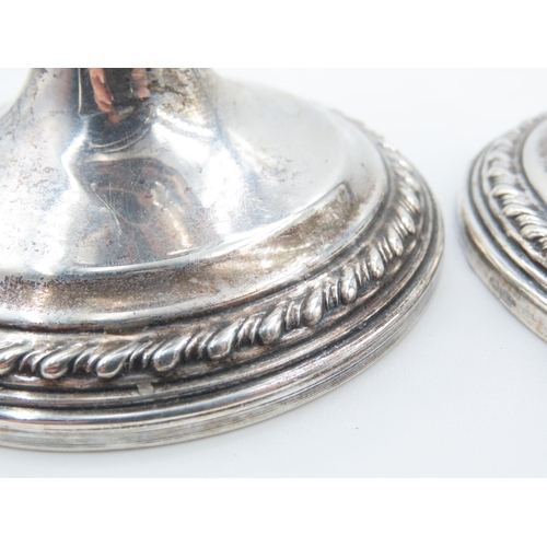 312 - Pair of Silver Turned Pedestal Form Candle Rests Each Approximately 4 Inches Diameter