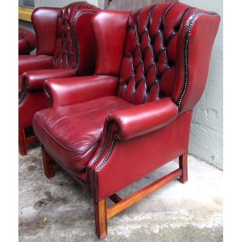 33 - Pair of Burgundy Leather Deep Button Upholstered Wing Back Armchairs Generous Form