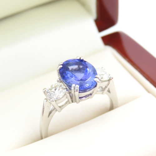 335 - Tanzanite and Diamond Three Stone Ring Mounted on Platinum Band Ring Size L and a Half