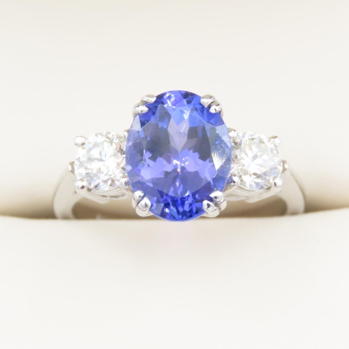 335 - Tanzanite and Diamond Three Stone Ring Mounted on Platinum Band Ring Size L and a Half