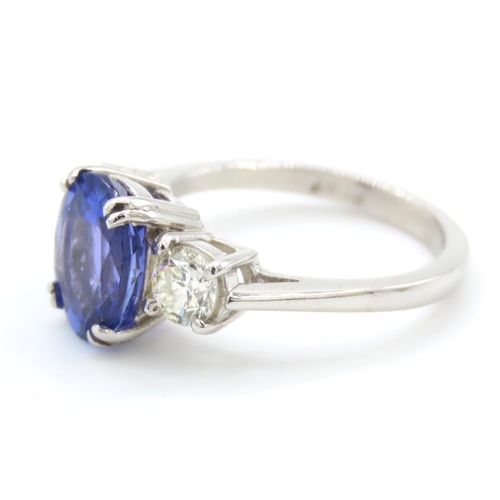 335 - Tanzanite and Diamond Three Stone Ring Mounted on Platinum Band Ring Size L and a Half