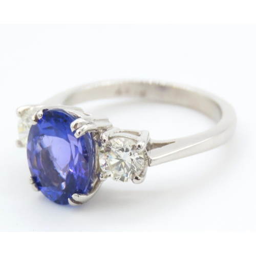 335 - Tanzanite and Diamond Three Stone Ring Mounted on Platinum Band Ring Size L and a Half