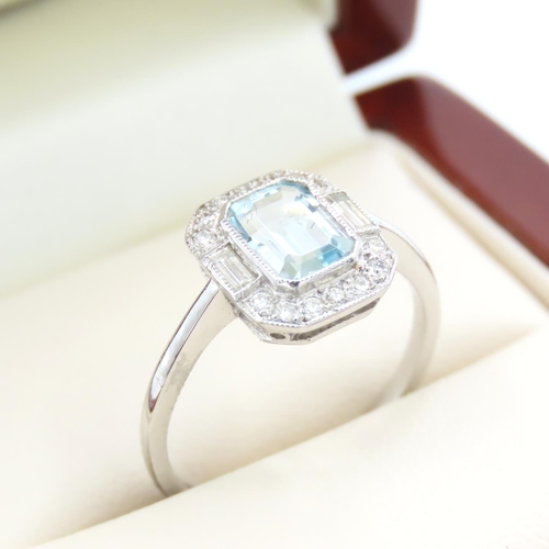 337 - Aquamarine and Diamond Emerald Cut Ring Mounted on Platinum Band Ring Size M