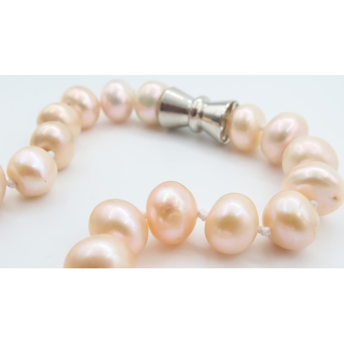 344 - Pearl Single Strand Necklace Graduated Form Silver Barrell Clasp Pinkish Hue to Pearls Necklace 42cm... 