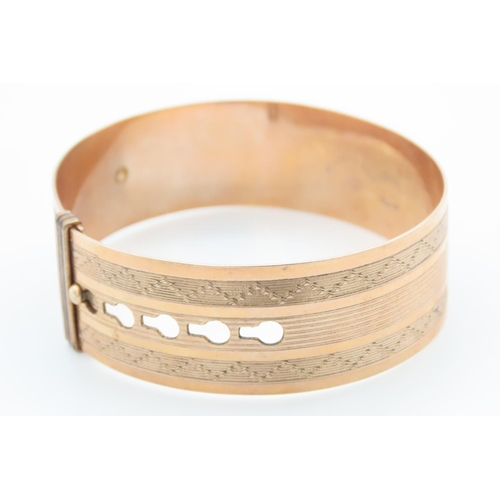 349 - Nine Carat Rose Gold Buckle Motif Bangle