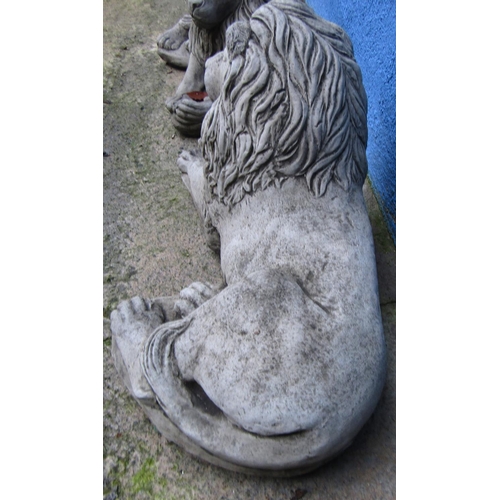 37 - Pair of Composite Stone Figures Recumbent Lions Each Approximately 30 Inches Wide