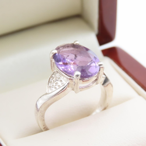 374 - Amethyst Oval Cut Four Claw Set Silver Ring Size M