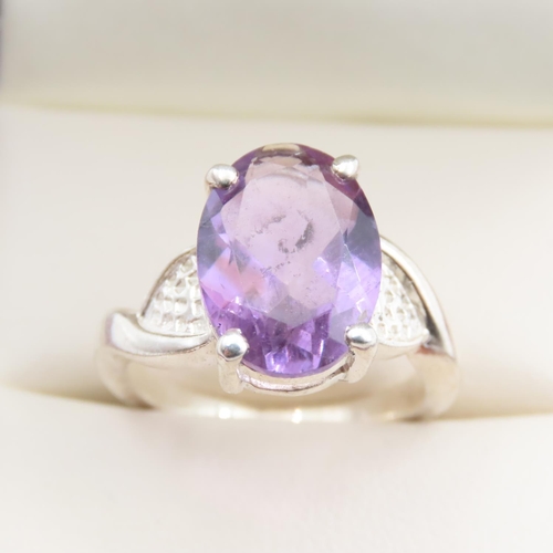 374 - Amethyst Oval Cut Four Claw Set Silver Ring Size M