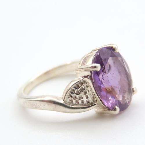 374 - Amethyst Oval Cut Four Claw Set Silver Ring Size M