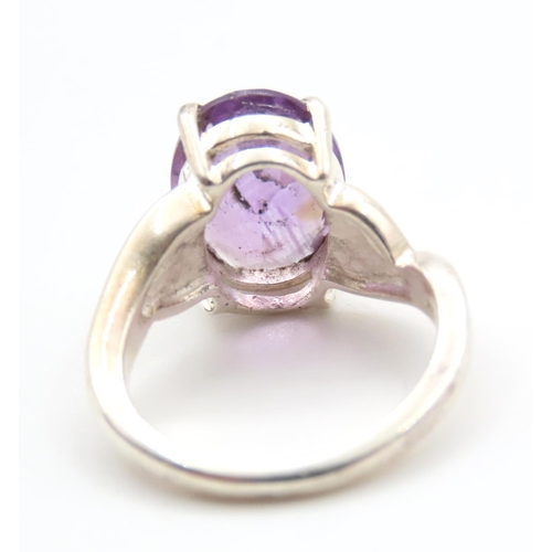 374 - Amethyst Oval Cut Four Claw Set Silver Ring Size M