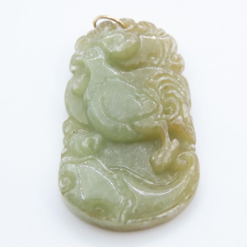 388 - Carved Oriental Jade Pendant Fourteen Carat Yellow Gold Bale Approximately 4cm High