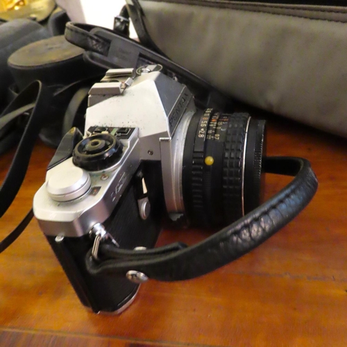 592 - Pentax Camera with Various Lenses and Padded Carry Case