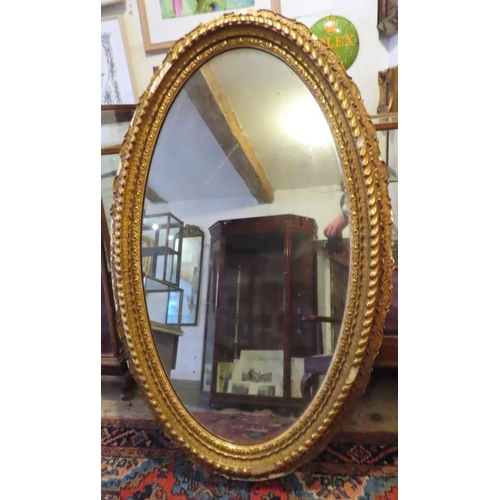 658 - Large Oval Form Gilded Wall Mirror Approximately 4ft High