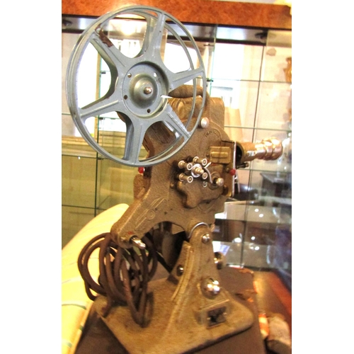 672 - Old Film Projector Electrified Seems to be in Working Order with Carry Case and Lens Present