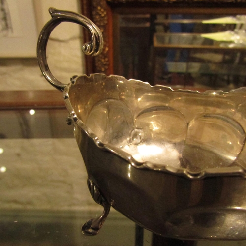 936 - Silver Sauce Boat Flying C Scroll Handle Above Shaped Supports