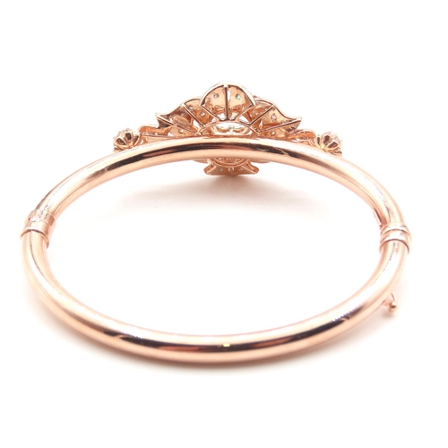 104 - 9 Carat Rose Gold Aquamarine Set Ladies Bangle Further Decorated with Diamonds Inner Width 6.5cm