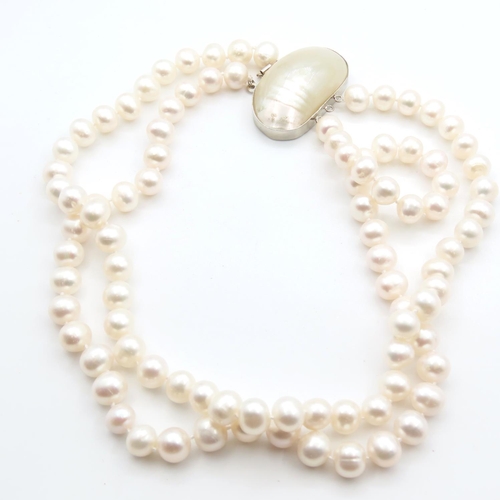 112 - Pearl Necklace 42cm Long with Shell Motif Adorned Clasp