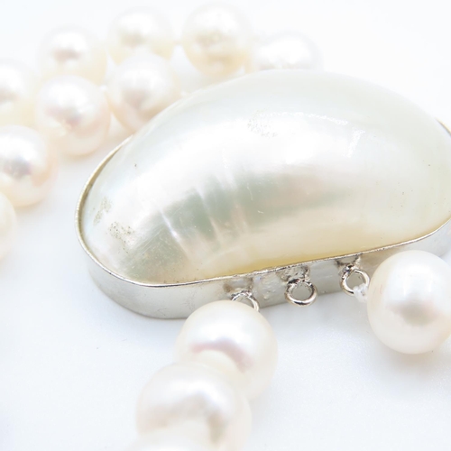 112 - Pearl Necklace 42cm Long with Shell Motif Adorned Clasp