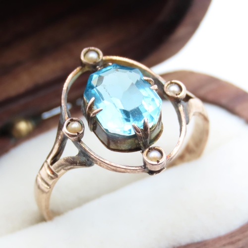 123 - Blue Topaz and Pearl Set Ring Mounted in 9 Carat Yellow Gold Ring Size R