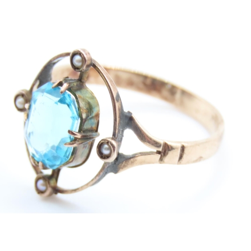 123 - Blue Topaz and Pearl Set Ring Mounted in 9 Carat Yellow Gold Ring Size R