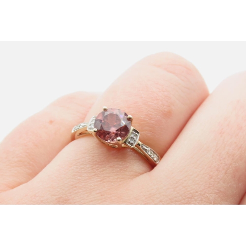 173 - Pink Tourmaline and Diamond Set Ladies Ring Mounted in 9 Carat Yellow Gold Ring Size N and Half