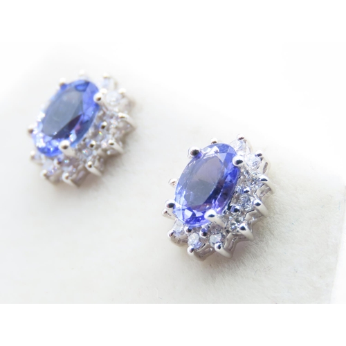 18 - Pair of Tanzanite and Diamond Set Ladies Cluster Earrings Set in 18 Carat White Gold Each 1cm High E... 