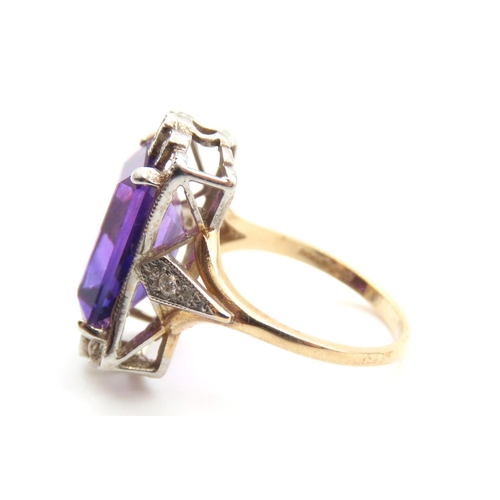 217 - Amethyst and Diamond Ladies Ring Mounted on 9 Carat Yellow Gold Band Ring Size O