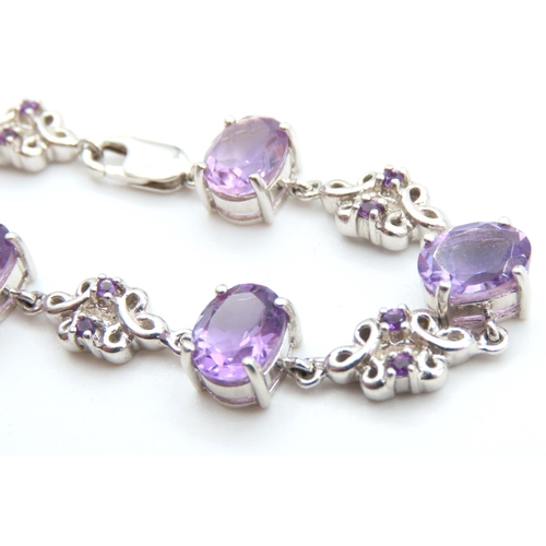 218 - Seven Stone Amethyst Set Bracelet Mounted on 9 Carat White Gold 19cm Long