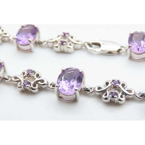 218 - Seven Stone Amethyst Set Bracelet Mounted on 9 Carat White Gold 19cm Long