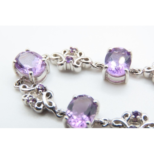 218 - Seven Stone Amethyst Set Bracelet Mounted on 9 Carat White Gold 19cm Long