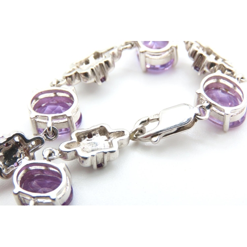 218 - Seven Stone Amethyst Set Bracelet Mounted on 9 Carat White Gold 19cm Long