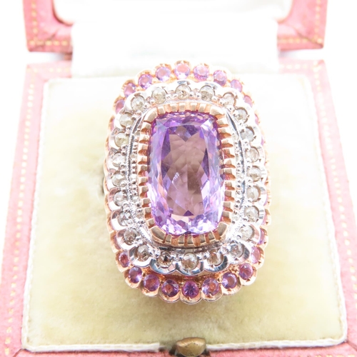 222 - Diamond and Amethyst Cluster Ring Centerstone Cushion Cut Mounted on 9 Carat Yellow Gold Band Basket... 