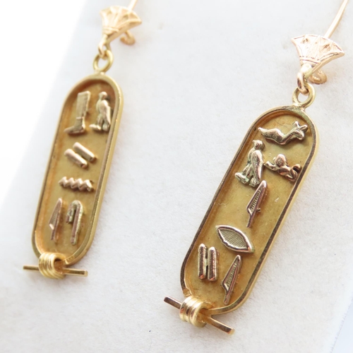 237 - Pair of 18 Carat Yellow Gold Hieroglyphic Drop Form Earrings Attractively Detailed Each 5cm High