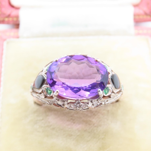 242 - Amethyst Four Claw Set Ladies Ring Diamond Decorated Surrounds with Inset Emeralds 9 Carat Rose Gold... 