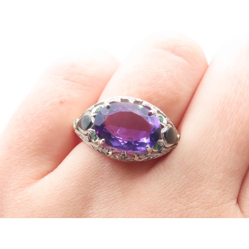 242 - Amethyst Four Claw Set Ladies Ring Diamond Decorated Surrounds with Inset Emeralds 9 Carat Rose Gold... 