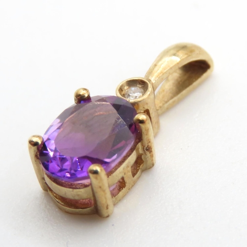 317 - Amethyst and Diamond Pendant Set in 9 Carat Yellow Gold 1.5cm High As New Unworn