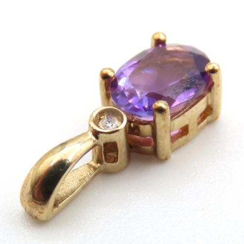317 - Amethyst and Diamond Pendant Set in 9 Carat Yellow Gold 1.5cm High As New Unworn