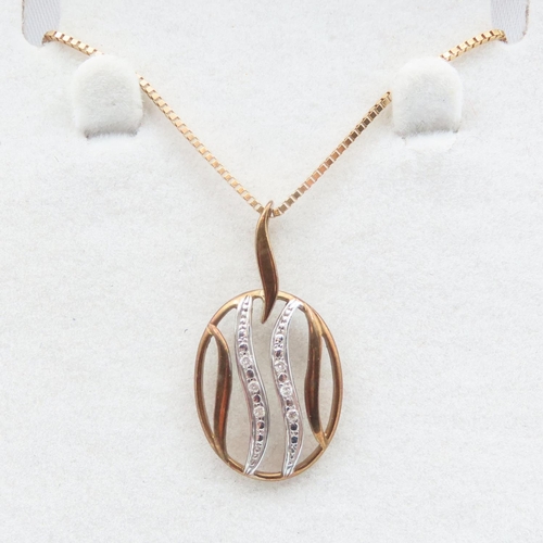 333 - Diamond Set 9 Carat Yellow Gold Oval Form Pendant 2.5cm High Further Set on 9 carat Yellow Gold Chai... 