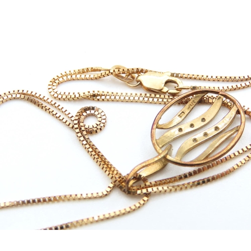 333 - Diamond Set 9 Carat Yellow Gold Oval Form Pendant 2.5cm High Further Set on 9 carat Yellow Gold Chai... 