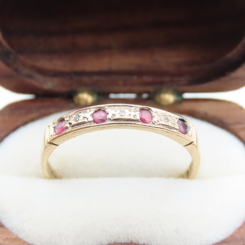 351 - Ruby and Diamond Set Ring Mounted in 9 Carat Yellow Gold Ring Size P and a Half As New Unworn