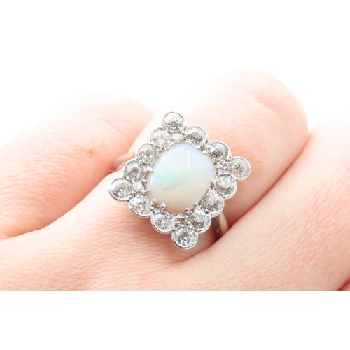 49 - Opal and Fourteen Diamond Set Ring Mounted in Platinum Ring Size M and a Half