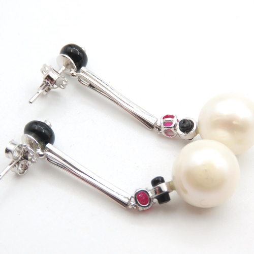 55 - Pair of Platinum Mounted 18 Carat White Gold Diamond and Ruby Set Drop Pearl Earrings 5cm Long