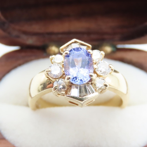 82 - Tanzanite and Diamond Ladies Cluster Ring Set in 14 Carat Yellow Gold Ring Size M and a Half