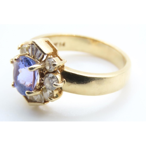 82 - Tanzanite and Diamond Ladies Cluster Ring Set in 14 Carat Yellow Gold Ring Size M and a Half