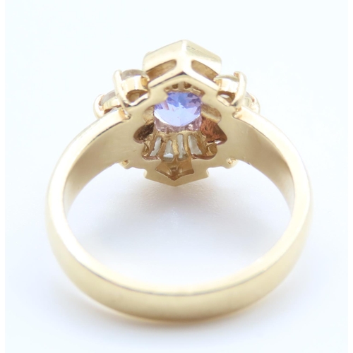 82 - Tanzanite and Diamond Ladies Cluster Ring Set in 14 Carat Yellow Gold Ring Size M and a Half