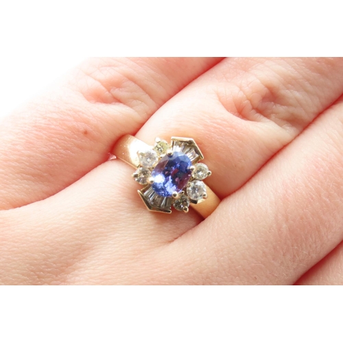 82 - Tanzanite and Diamond Ladies Cluster Ring Set in 14 Carat Yellow Gold Ring Size M and a Half