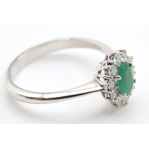 85 - Emerald and Diamond Ladies Ring Set in 18 Carat White Gold Ring Size Q