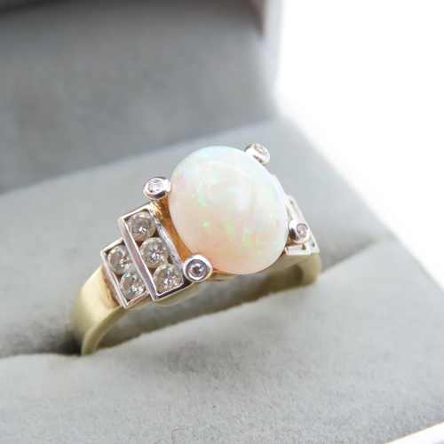 1422 - Centre stone Oval Cut Cabochon Polished Opal and Diamond Ladies Ring Set in 18 Carat Yellow Gold Rin... 