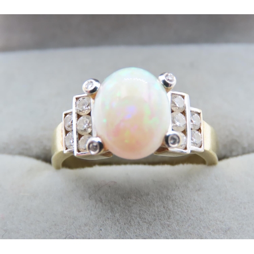 1422 - Centre stone Oval Cut Cabochon Polished Opal and Diamond Ladies Ring Set in 18 Carat Yellow Gold Rin... 