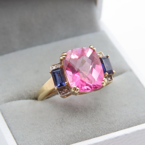 1431 - Pink Tourmaline Iolite and Diamond Set Ladies Ring Mounted in 9 Carat Yellow Gold Ring Size P